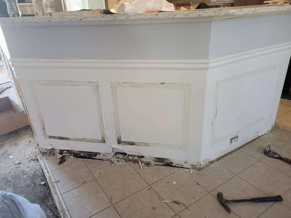 Water damage and mold on kitchen during Storm Damage Restoration in Andover
